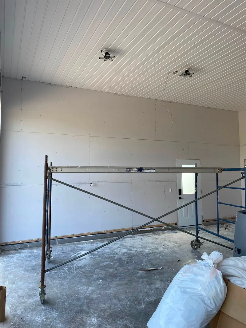 Scaffold work on a high commercial ceiling
